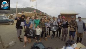 The NOMB Surfteam joining a local group to clean the beaches in Buchupureo, Chile